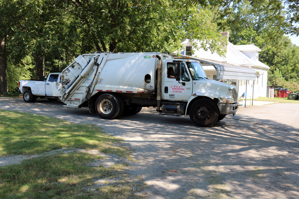 White garbage truck for residential garbage service